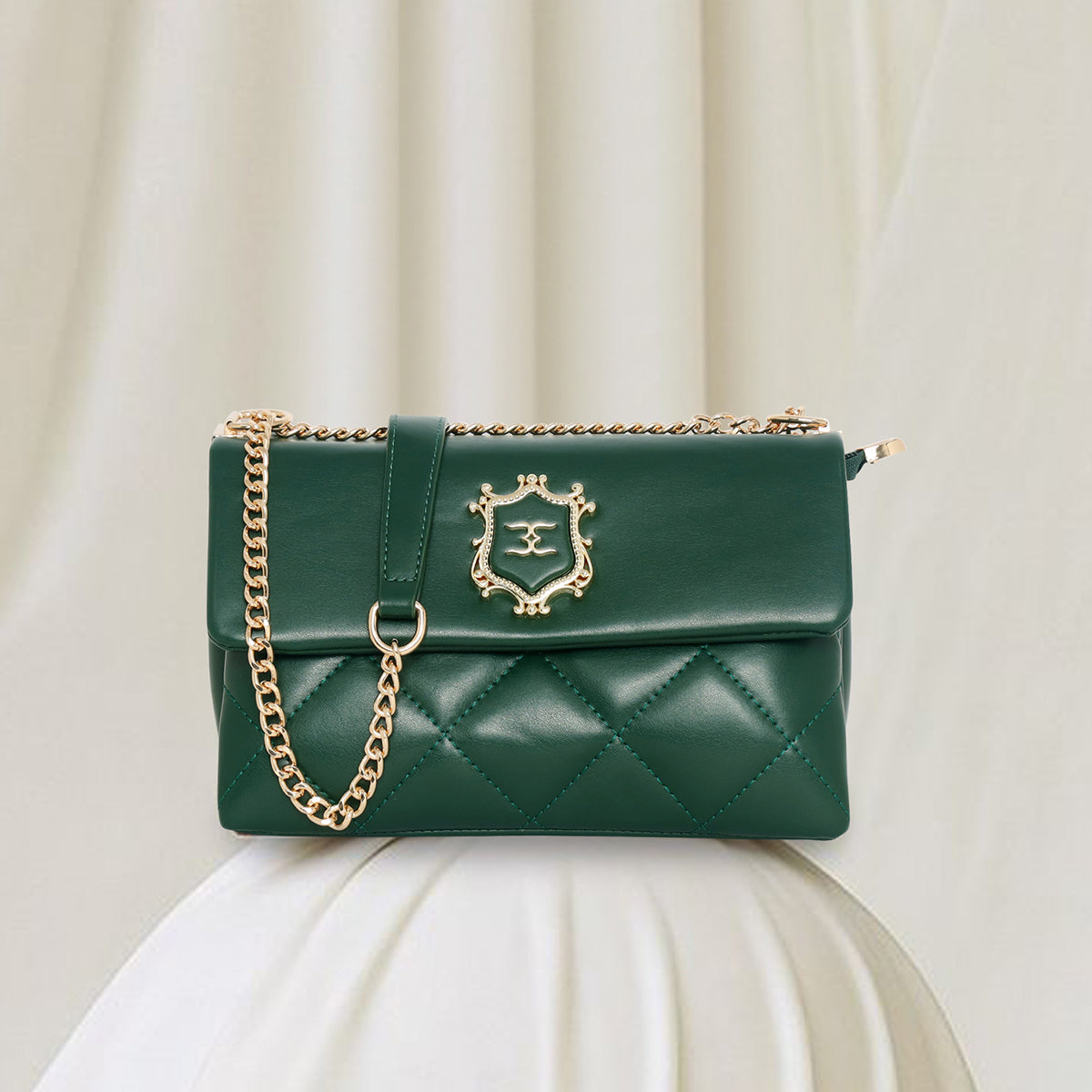 Emerald Crest Quilted Slingbag For women